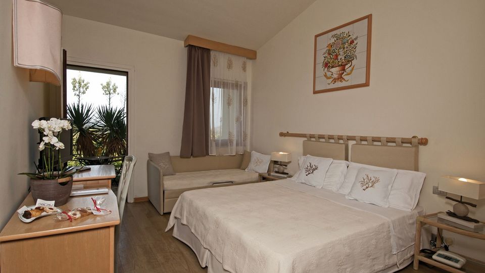 Hotel Palau Zimmer ©Hotel Palau - momento Zimmerbeispiel im Hotel Palau auf Sardinien in Italien
